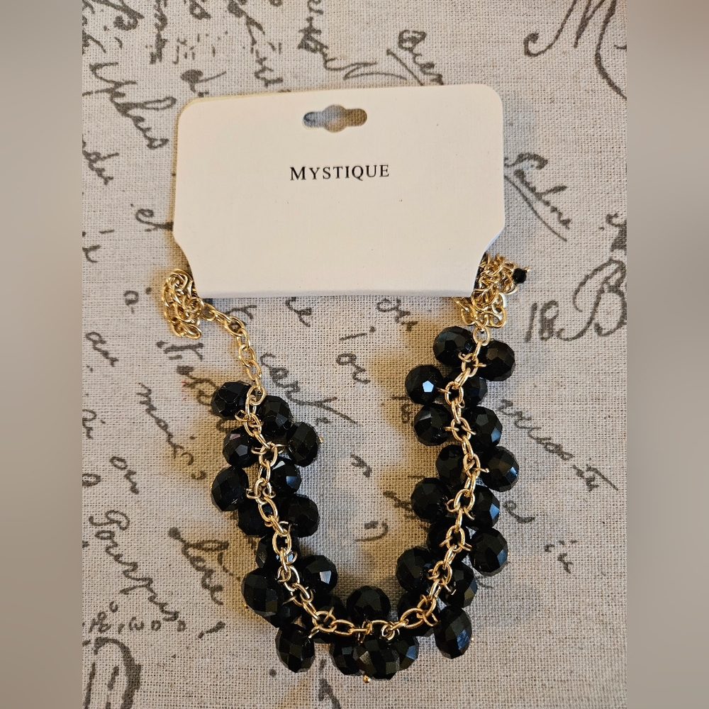 Mystique goldtone and black stone necklace
